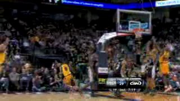 NBA Monta Ellis drives to the basket and nails a tough bank