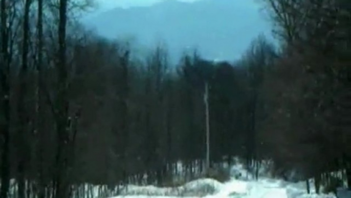 Snow sledding a 1/4 mile downhill