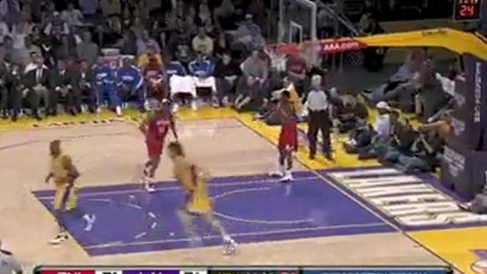 Pau Gasol picks up the loose ball and throws down a one-hand