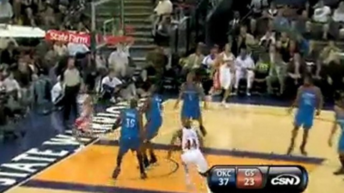 Monta Ellis drives to the basket and sinks a nice layup.