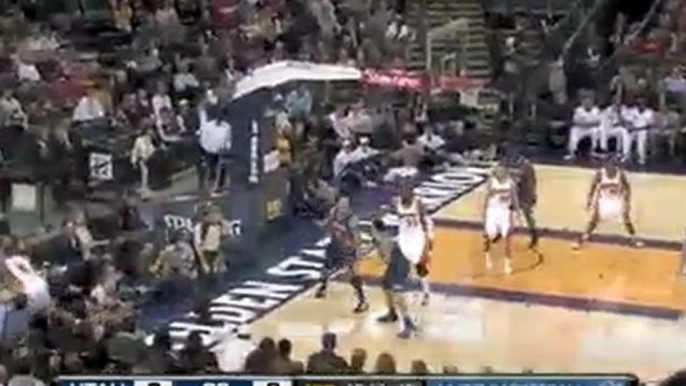 Monta Ellis jumps at Deron Williams and blocks his shot from