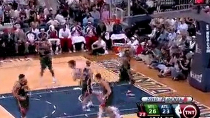 Zaza Pachulia picks up the loose ball and takes it in for th