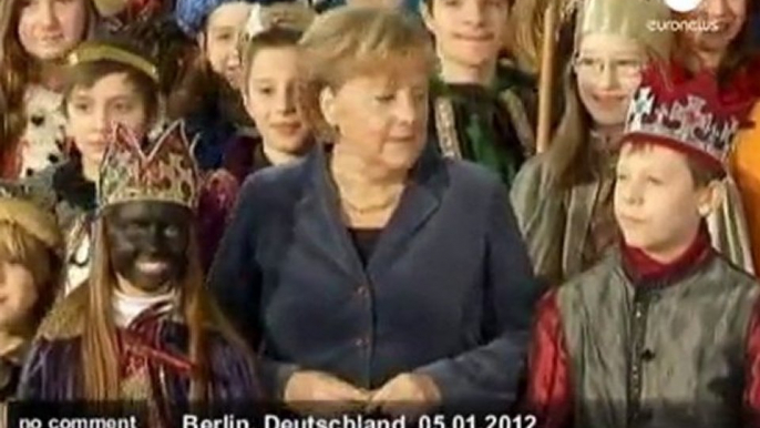 Merkel sings for charity - no comment