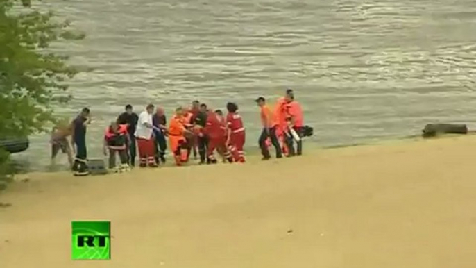 Video: Biplane crashes at air show, plunges into river in Poland