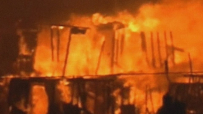 Flooded homes hit by superstorm Sandy on fire in New York