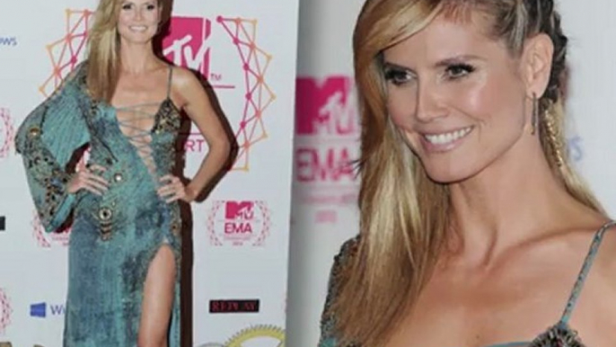 Heidi Klum Shocks in Revealing Lace-Up Dress at MTV EMAs