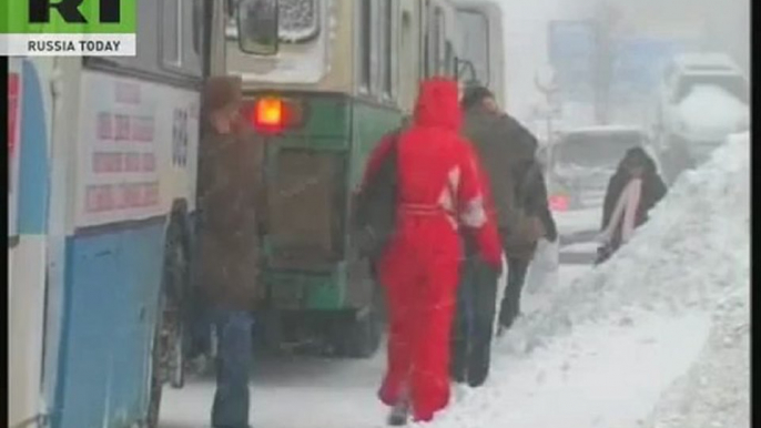 Thousands to freeze as storms cut off power in Far East