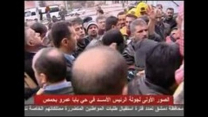 Visite de Bachar Al-Assad dans le quartier de Baba Amr à Homs