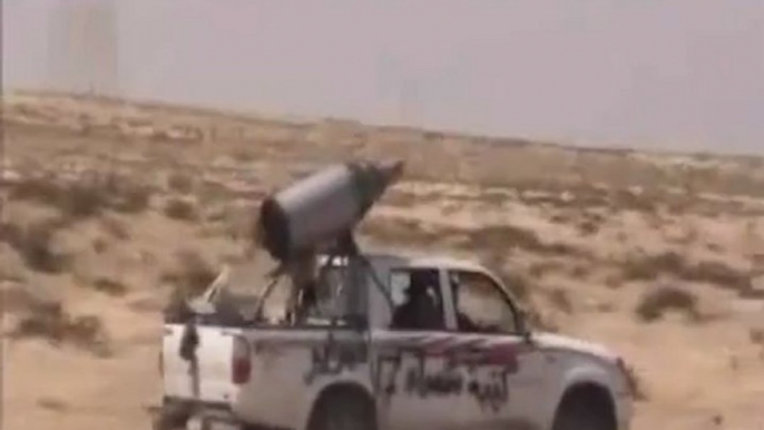 Libyan Rebels vehicles mounted with homemade rocket launchers!