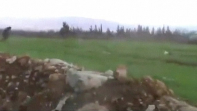 Rebels battle Syrian forces outside Homs