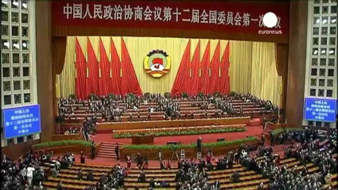 Des milliers de représentants de la société chinoise...