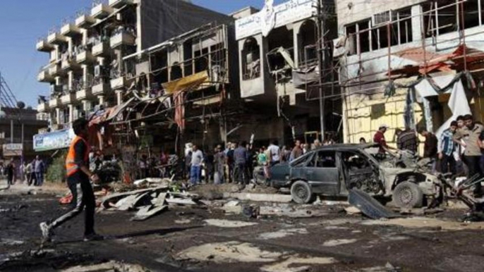 Series of bomb blasts kill scores in Baghdad