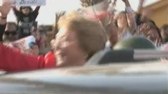 Protester spits in former Chilean president's face