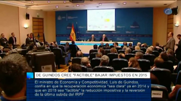 De Guindos cree "factible" bajar impuestos en 2015 y ultima un apoyo para las pymes