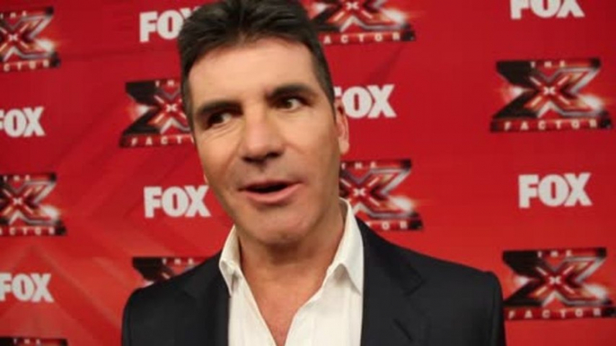 Simon Cowell Admits Fame At A Young Age Would Have Killed Him