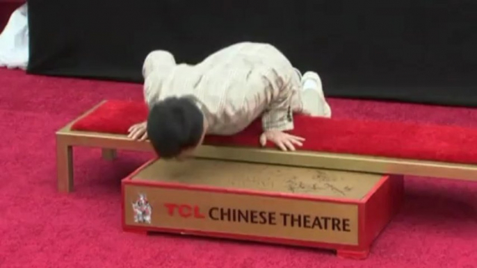 Jackie Chan leaves prints at the Chinese Theatre