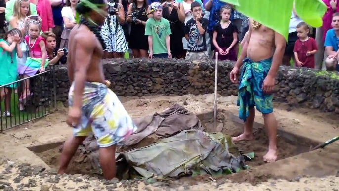 Maui Gim --  Kalua Pig Ceremony Kaanapali Sunset Luau at Black Rock, Maui, Hawaii