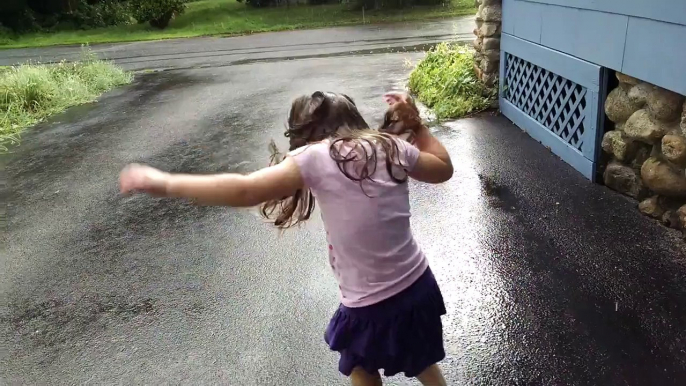 Puddle jumping and singing in the rain