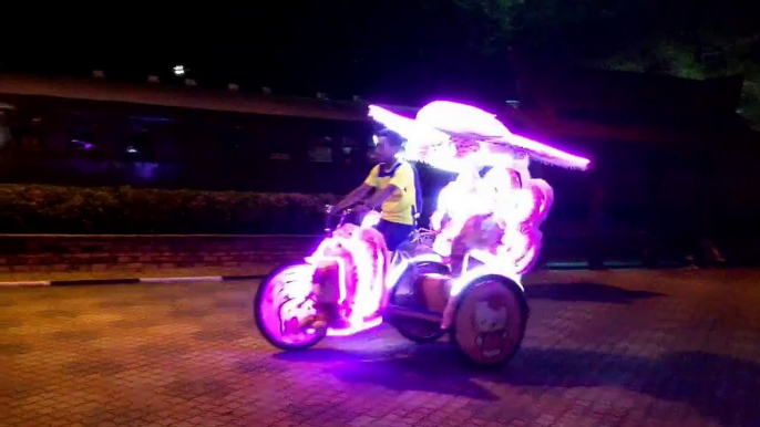 Tuk tuks in Melaka, Malaysia... They're like fairies on steroids!