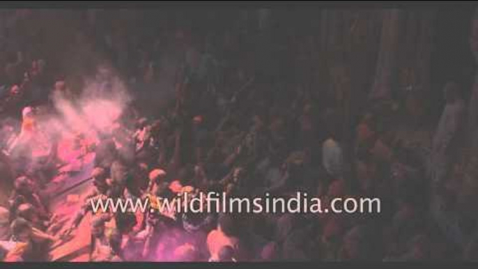 Indian revelers celebrate Holi at Banke Bihari temple - Vrindavan