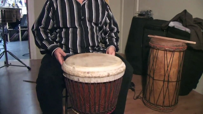 How To Play West African Drums : Playing Bass Sounds on Djembe African Drums