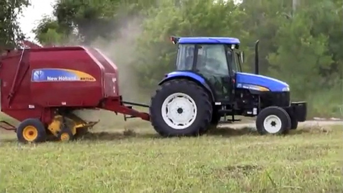 New Holland TD95D Tractor Sitrex Wheel Hay Rake and New Holland BR7060 Round Hay Baler