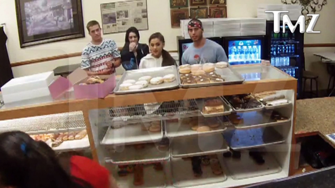 Ariana Grande licks donuts at shop and says she hates Americans