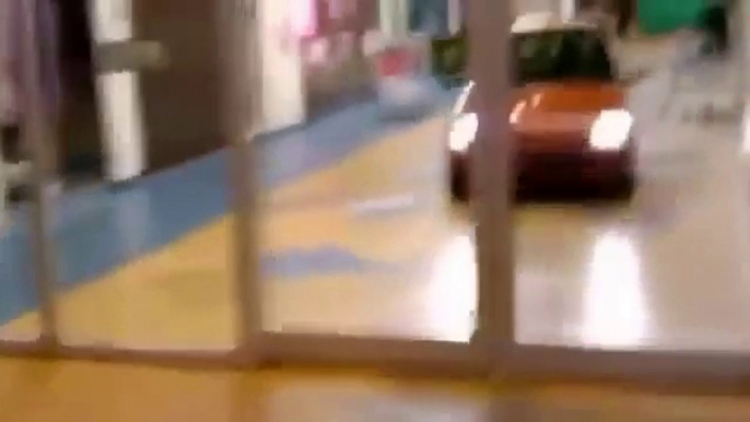 Russian guys get into supermarket with tiny car! Hilarious!