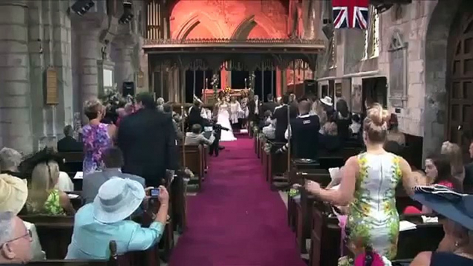 Bride and groom celebrate wedding with a flash mob dance