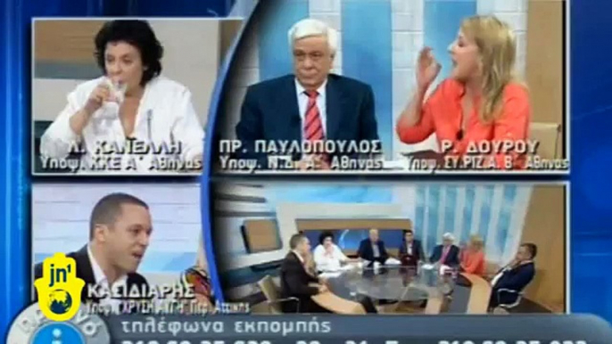 Greek Neo-Nazi 'Golden Dawn' Spokesman Punches Female Politician a Live TV Debate, Throws Water