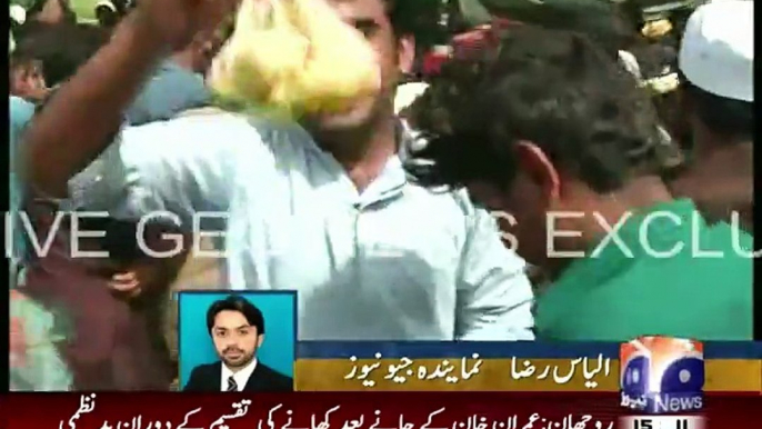 Desperate flood-victims attack food after Imran Khan speech