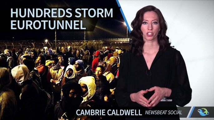 Hundreds of Migrants Attempt to Access Freight Tunnel from France into Britain