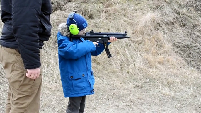 7 year old kid first training with MP5 .22lr