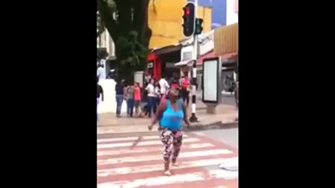 Fat woman shows up her sword skills in the streets