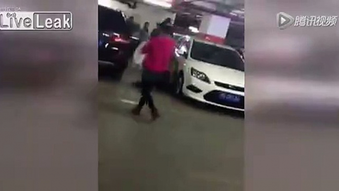 Wife beats husband's girlfriend at parking garage