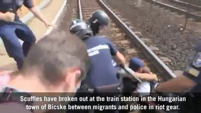 Refugee throws wife and baby on to train tracks in protest to migrant camps