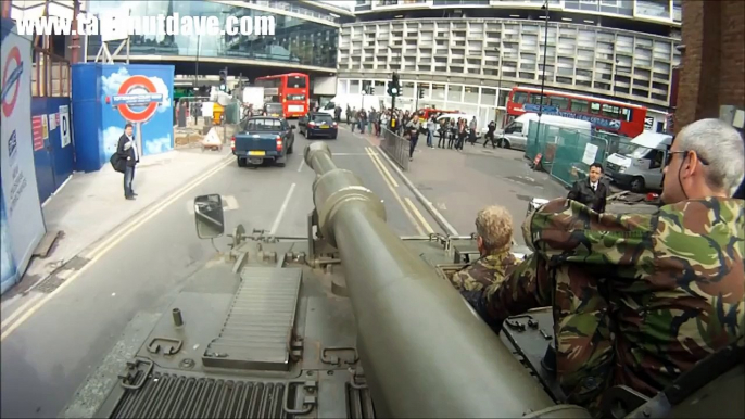 Crazy guy wants to get run over by a tank!