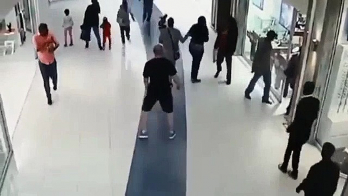 A Would-Be Robber is Whammed by Helpful Shopper