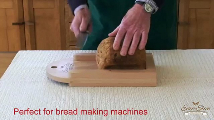 The easy to use "Eezi-Slice wooden bread board" - the best device for slicing a fresh bread loaf.