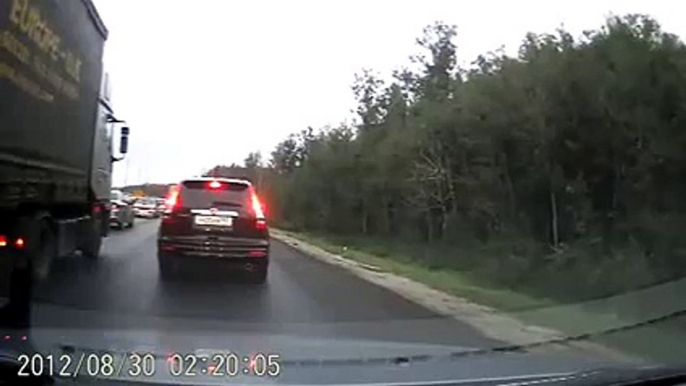 Ford Focus tries to pass on the shoulder. Not a good idea FAIL hilarious accident wreck fa