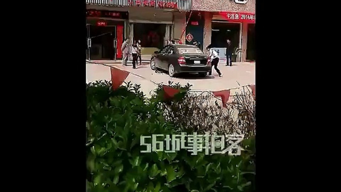 Wife with daughter and son smashes husband's car