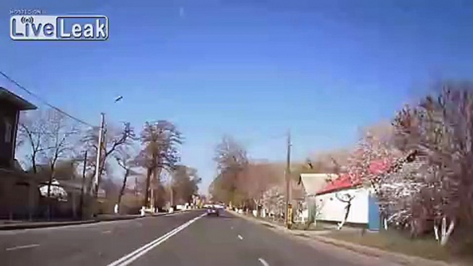 Speeding car loses control and causes nasty head-on crash