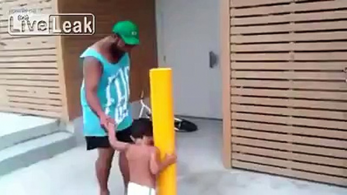 Two-year-old skateboarder shows his skills