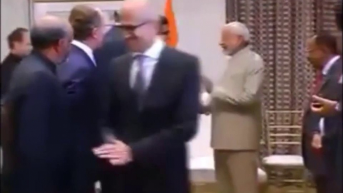 Microsoft CEO Satya Nadella wipes hands after hand-shake with PM Modi