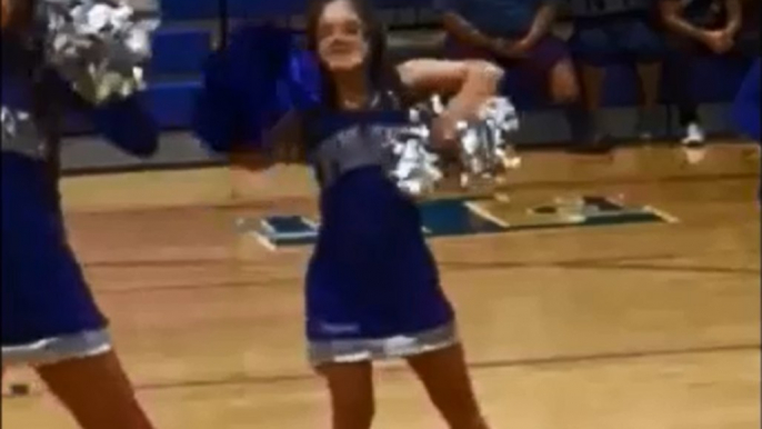 Student Overcomes Down's Syndrome for Spirited Cheerleading Routine