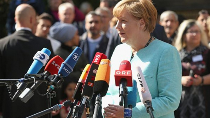 Merkel slams eastern Europeans on migration