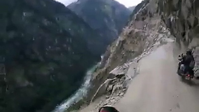 Insane bikers riding dangerous roads on top of indian mountain.... Amazing