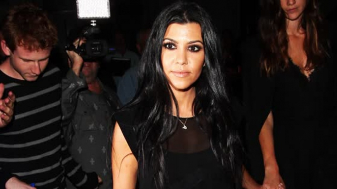 Kourtney Kardashian Gets Swamped, Swears at Photographers