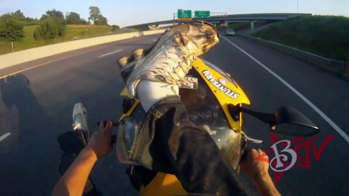 Motorcycle STUNTS Street Bike Stunt Rider Performs Long WHEELIE On Highway Riding Honda CB