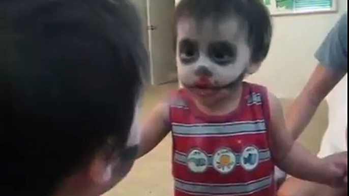 Baby Scares himself in the mirror